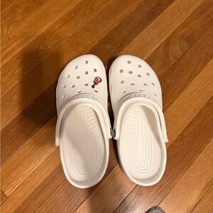 CROCS White - never worn.  Size W 9/M 7